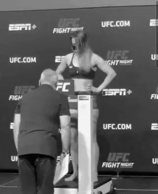 A UFC woman who collapsed during her weight.gif