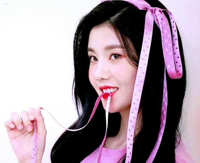 Kwon Eunbi with a ribbon in her mouth