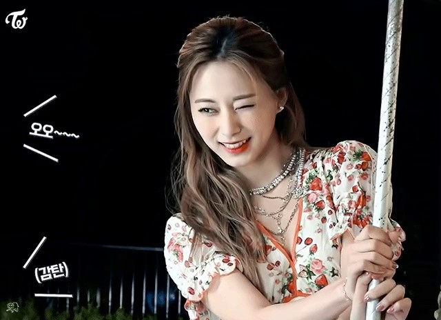 Tzuyu is embarrassed by the admiration of the filming staff.