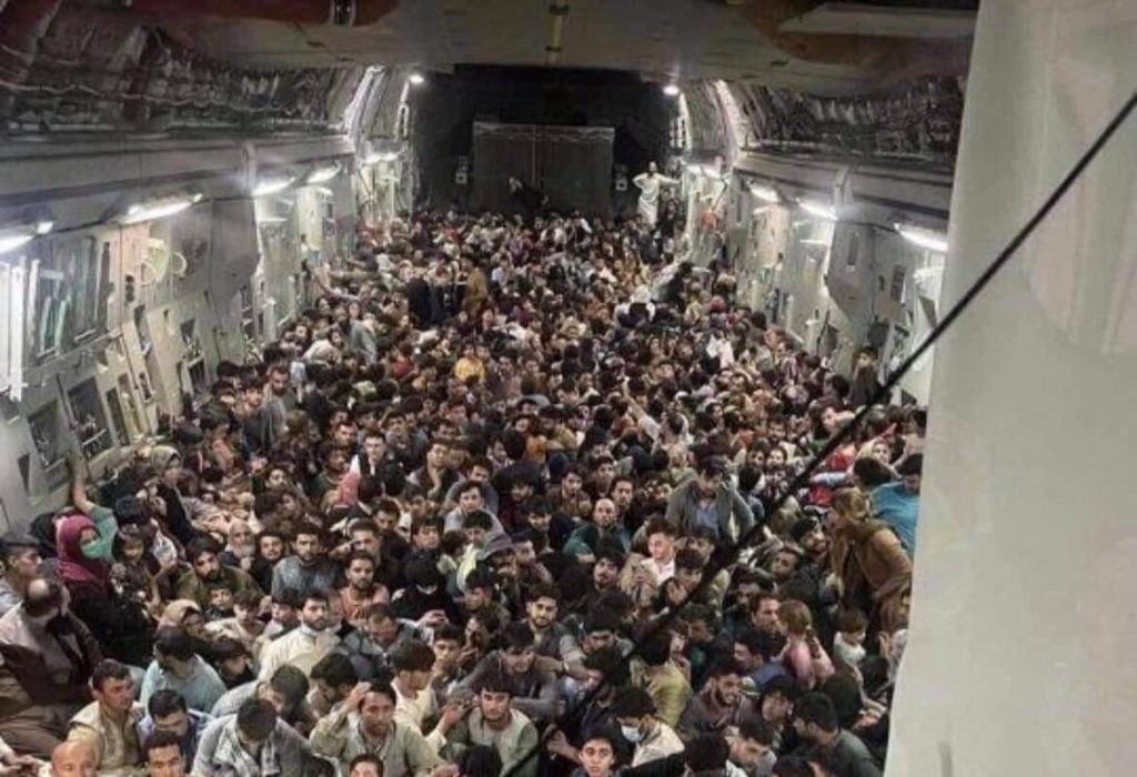 Inside a transport plane escaping from Afghanistan.