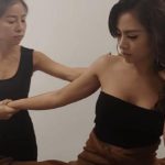 Vietnamese woman who gets arm massage.