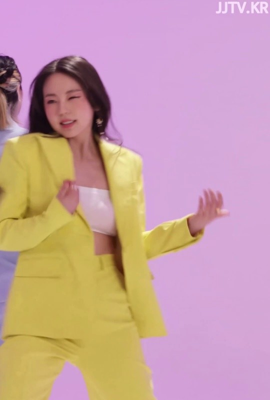 SOHEE, the top tube in a yellow suit.
