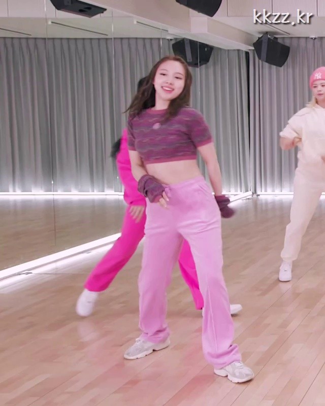 Sweatpants. TWICE NAYEON, standing up from behind.