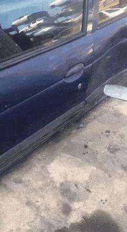 Opening the car door with a GIF forklift.
