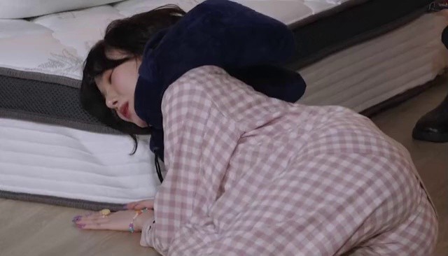 Bibiji Eunha lying down in pajamas.