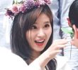 SANA wearing a flower crown.