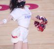 Tight white T-shirt, white shorts, Yongkyung cheerleader.