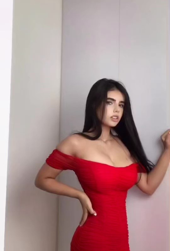 The red dress girl coming close to the camera
