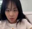 Vivi is doing a live with her chest zipped open