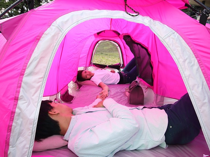 A tent where you sleep holding hands only in Japan.jpg