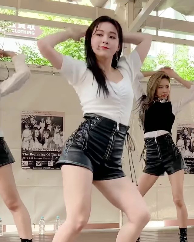 Gahyeon of DREAMCATCHER is wearing black leather shorts