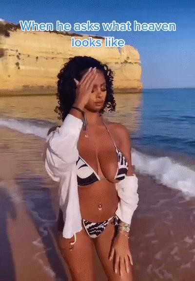 Black Woman Walking on the Beach