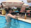 Bikini wife slow motion coming out of the water
