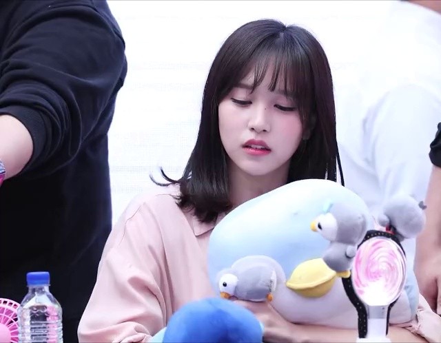 TWICE MINA is playing with a penguin doll