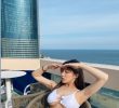 Gyungyi posted a picture of a white bikini underboop
