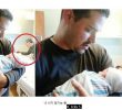 Two dads taking care of their daughter after giving birth
