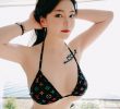 Jung-mi, a racing model whose chest sticks out from the bikini