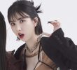 Eunha's chest volume emphasized by string harness