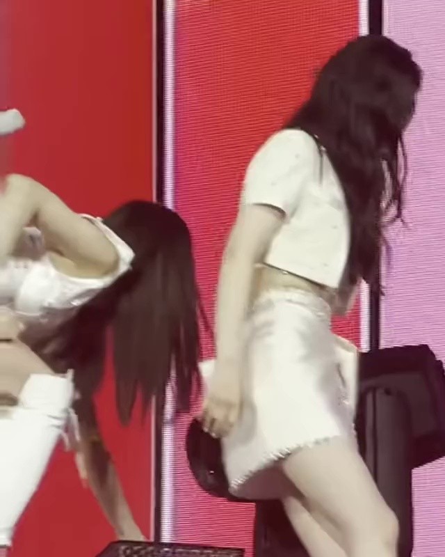 SANA's thighs, putting down the microphone