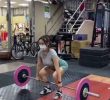 An older sister who learns weightlifting with a big chest