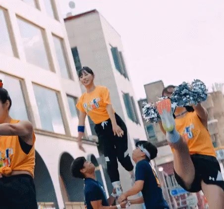 Cheerleaders busking in Hongdae