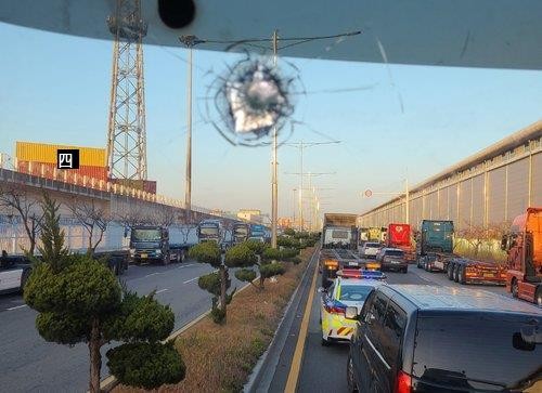 A union member of the Korea Cargo Workers' Union was arrested for shooting iron beads into a non-union vehicle