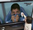 Photo: Japanese kid wiping Suarez's tears instead (Laughing)