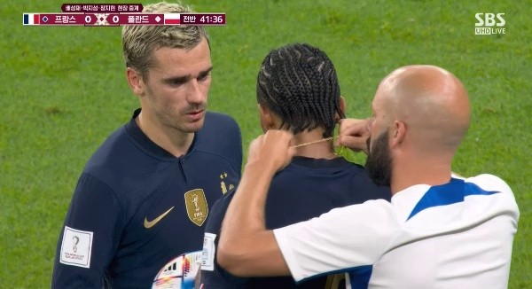 France vs Poland, too. I take off my necklace after being pointed out shivering