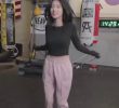 HYE WON is jumping rope. She's shaking her chest