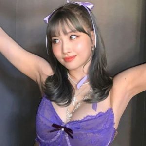 TWICE MOMO's lingerie style outfit.