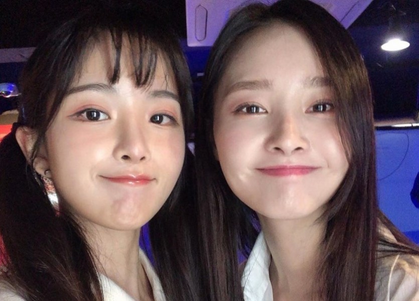 Cho Hyunyoung and Woohee.
