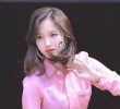 MINA of TWICE who untie her hair.