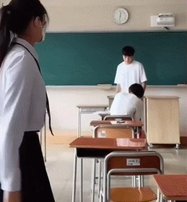 A high school girl cheering for a depressed friend, gif.