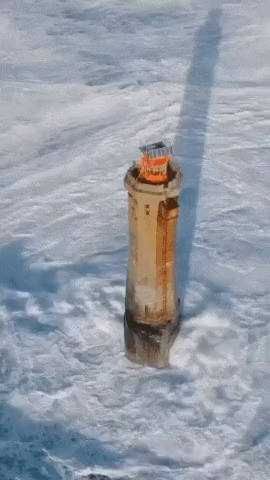 a lighthouse wave
