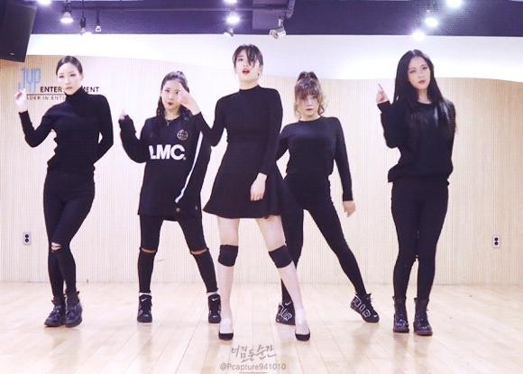 Suzy is practicing dance with the older members.
