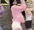 Pink cardigan and skirt rolled up. Honey thighs. Wow! Nana