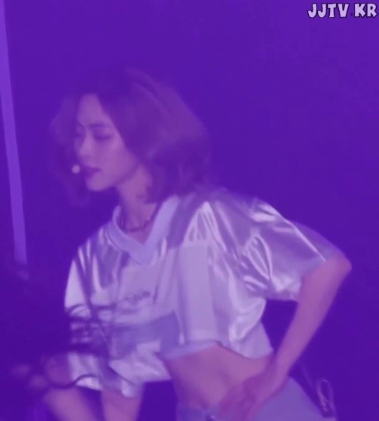 ITZY's loose cropped T-shirt. There's a band under the chest, RYUJIN.