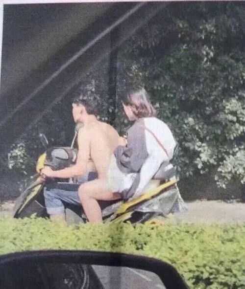 a naked young man riding a young man