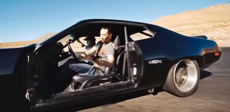 The action scene of John's 4 car that Keanu Reeves performed himself