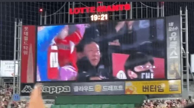 The president who cares about the baseball fan next to him