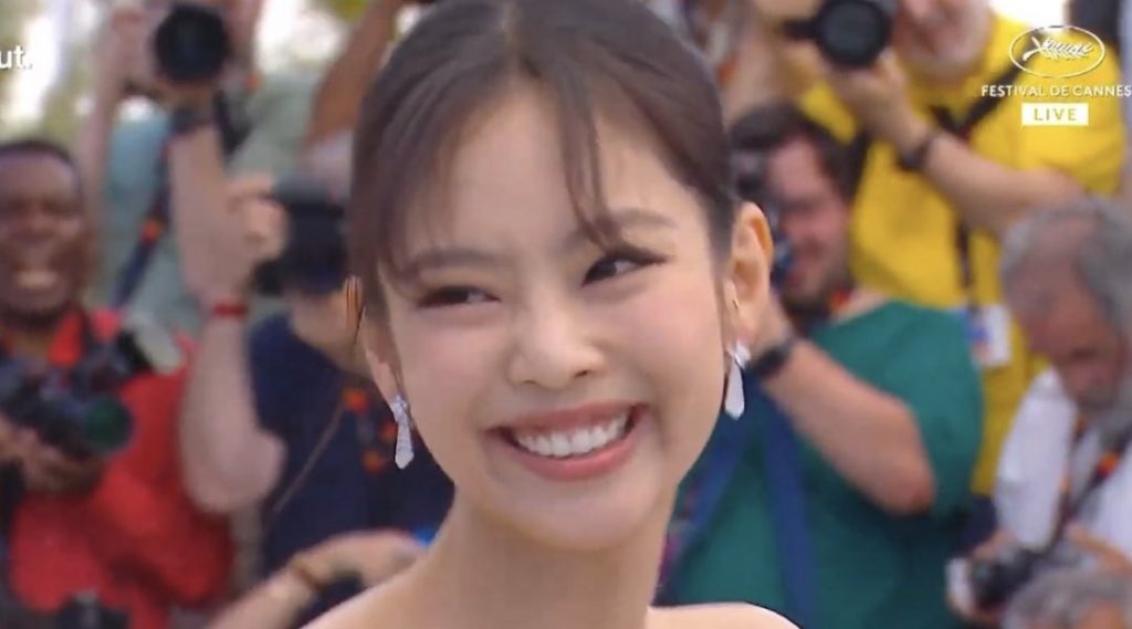 Journalists at the Cannes Film Festival demonstrating BLACKPINK's Jenny Summoning