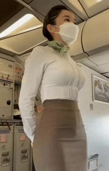 The stewardess who demonstrates the safety rules of the plane