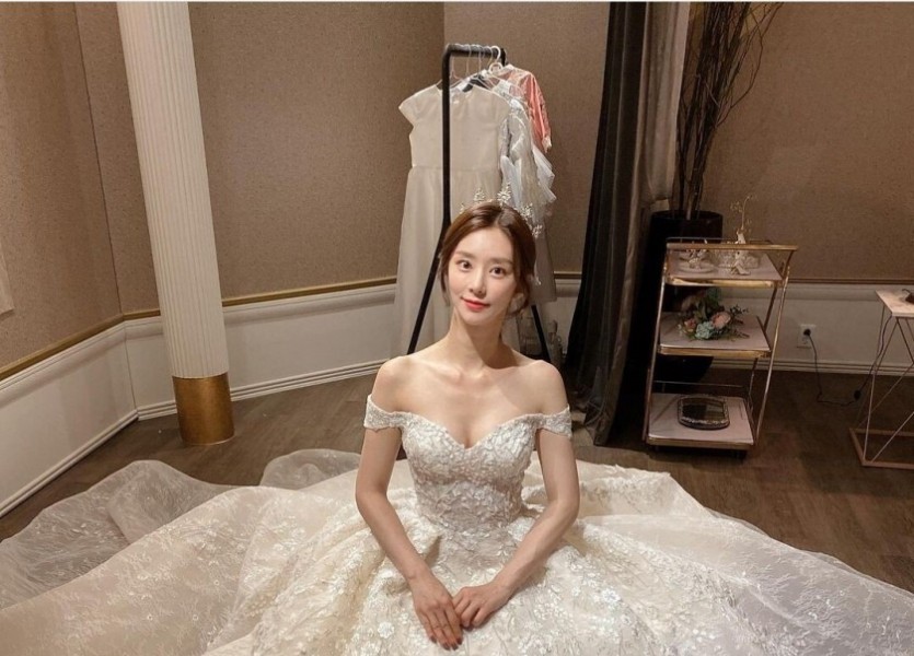 Lee Joobin in a wedding dress