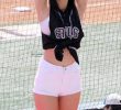 an excellent cheerleader with a loose-fitting sleeveless shirt