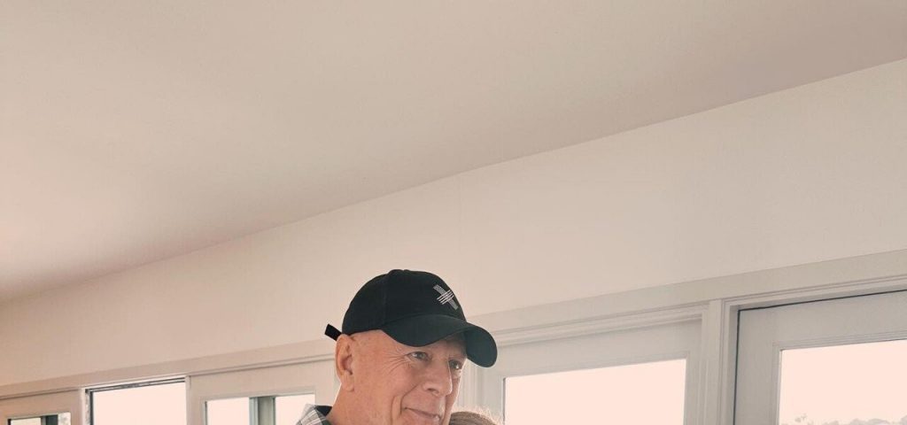 Bruce Willis with his first grandchild