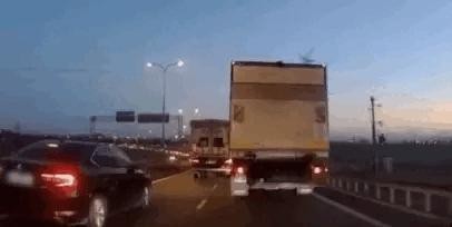 Truck driver blocking the way by honking gif