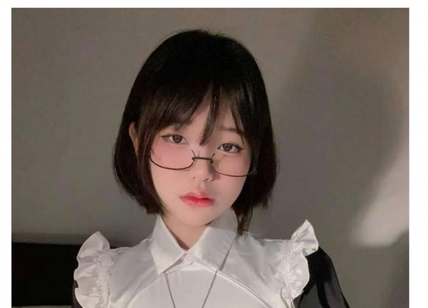 a girl with glasses on