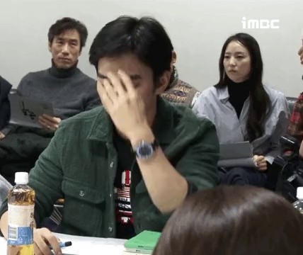 Actor gif who feels embarrassed because he's not wearing makeup