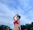 The last female camera who enjoyed the water park in a red bikini