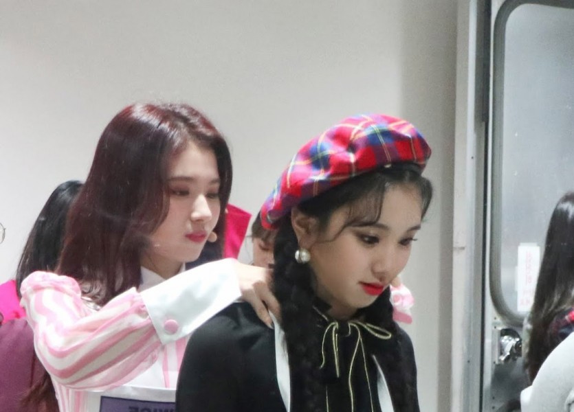 SANA and CHAEYOUNG massaging each other